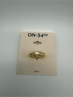 ON·34TH Gold Ring with Cream Oval Accent